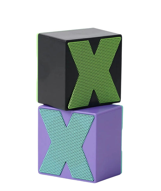 Two letter 'X' blocks, one black with green 'X', the other purple with teal 'X', on a white background.